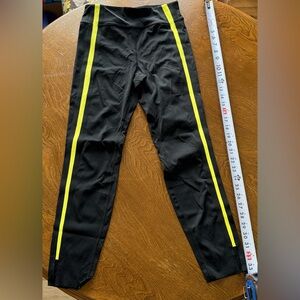 Zyia black with yellow stripes leggings, size 4